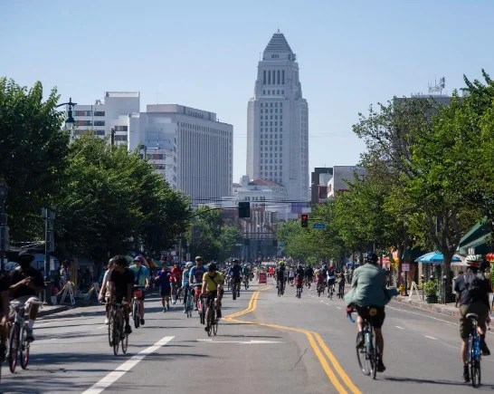 Bicyclists ride on car free street during CicLAvia Los Angeles downtown