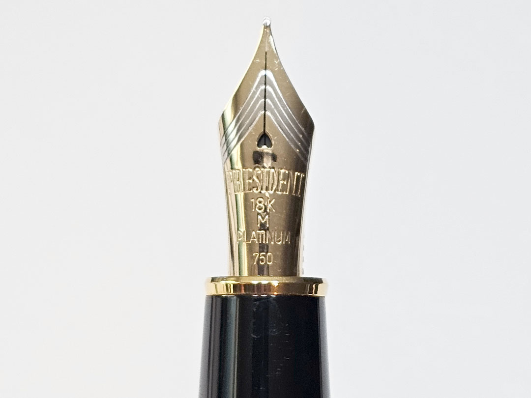 Platinum President Nib featuring a contrasting band near the tip with several lines and the word President at the center