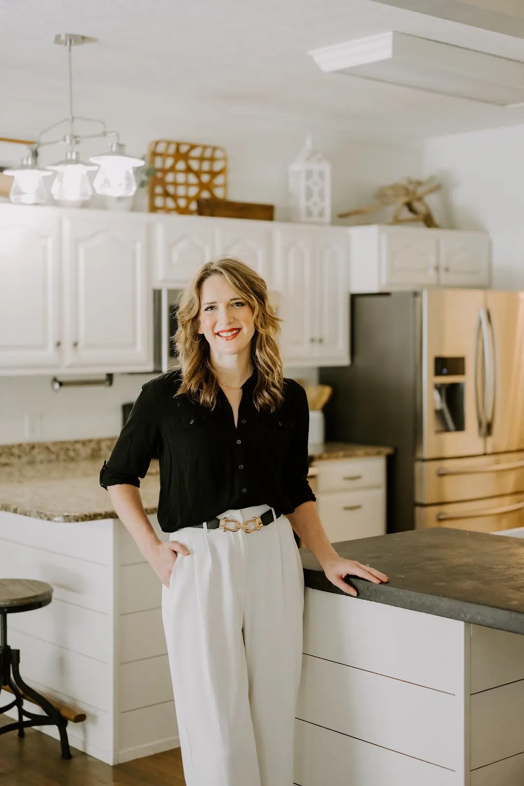 Rachel Ferrell in a bright kitchen with a large island
