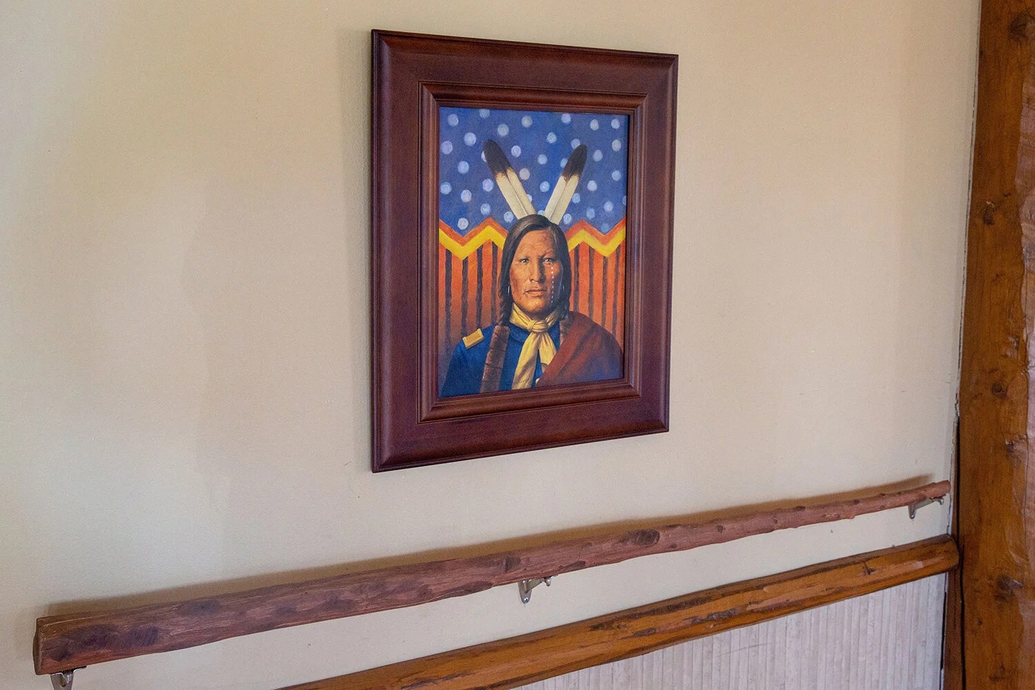 Pintura enmarcada de un jefe indigena de la tribu Kickapoo en una pared