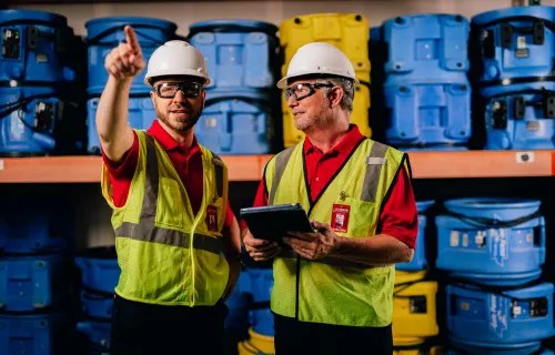 team members planning for commercial water damage emergency