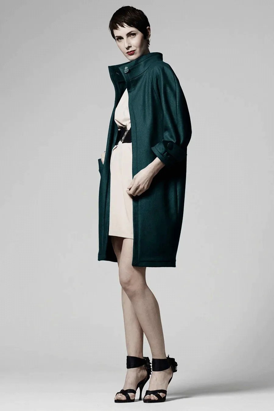 Fari cocoon coat sewing pattern made in dark teal wool, worn open, front view