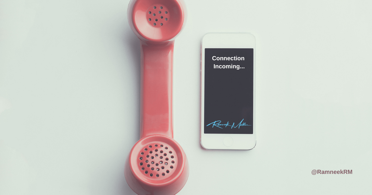 Regular Phone and Cell Phone next to each other