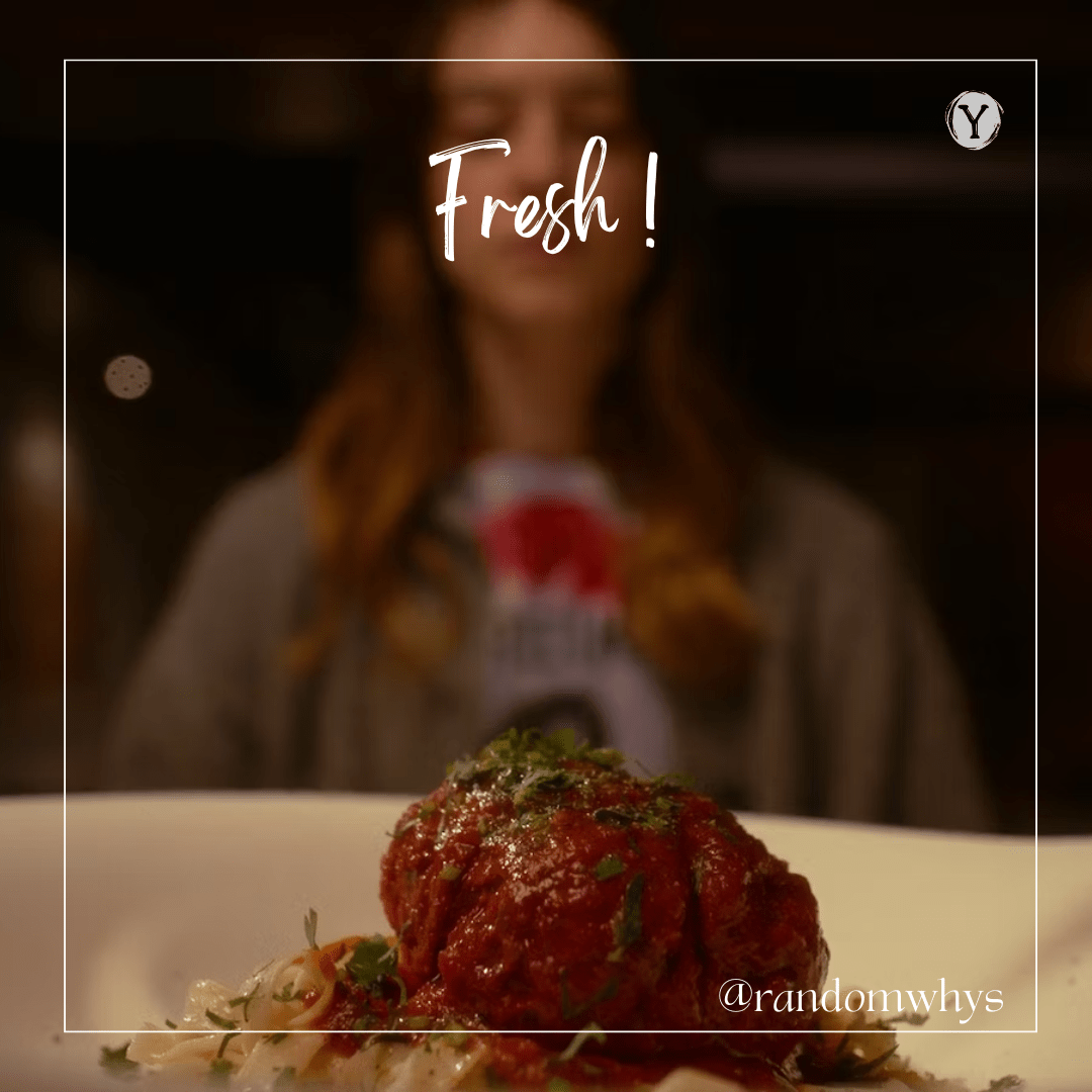 A scene from the movie Fresh featuring a dish of meat with sauce, blurred image of a woman in the background.