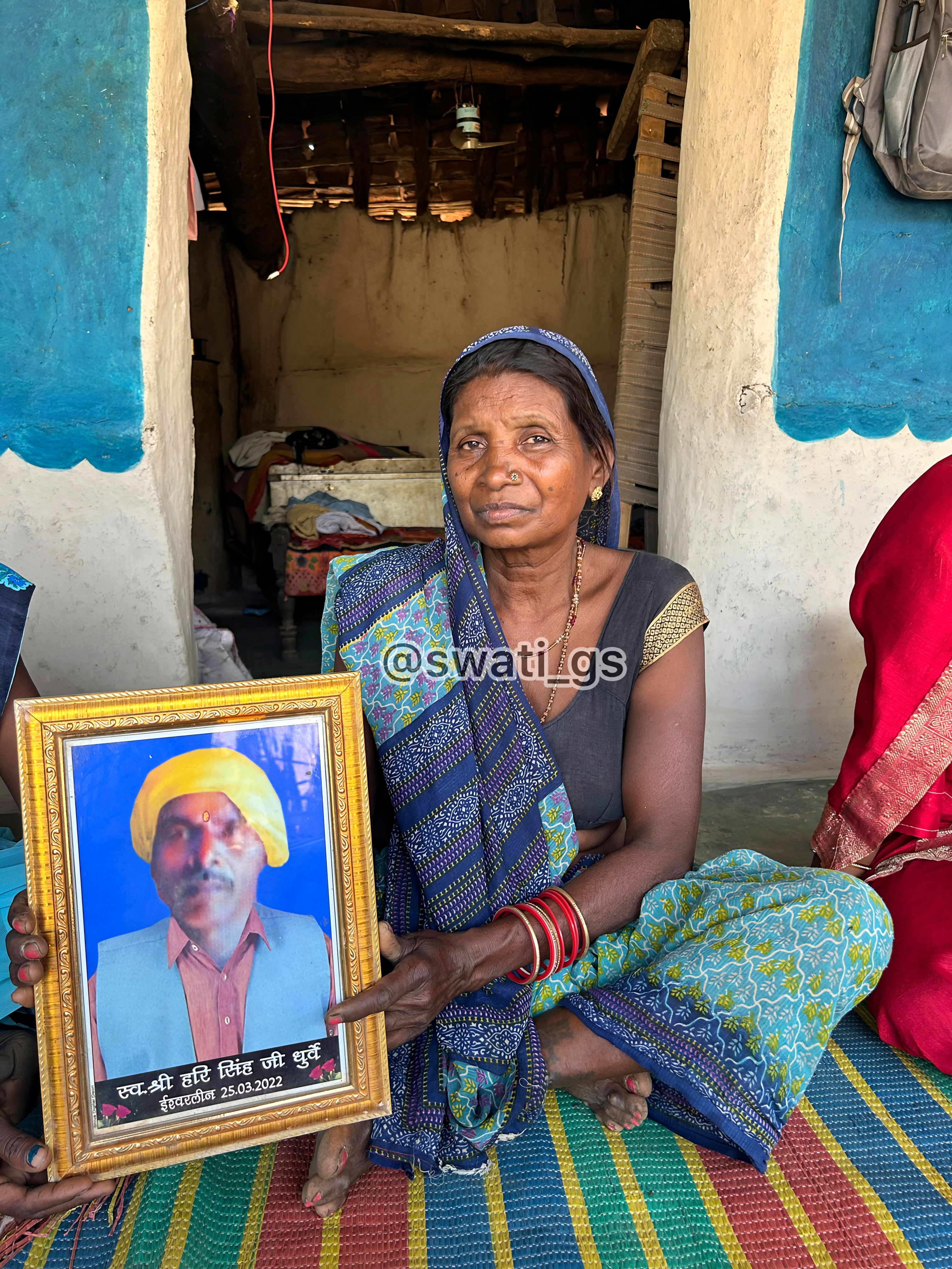 Phoolabai with her husband's picture
