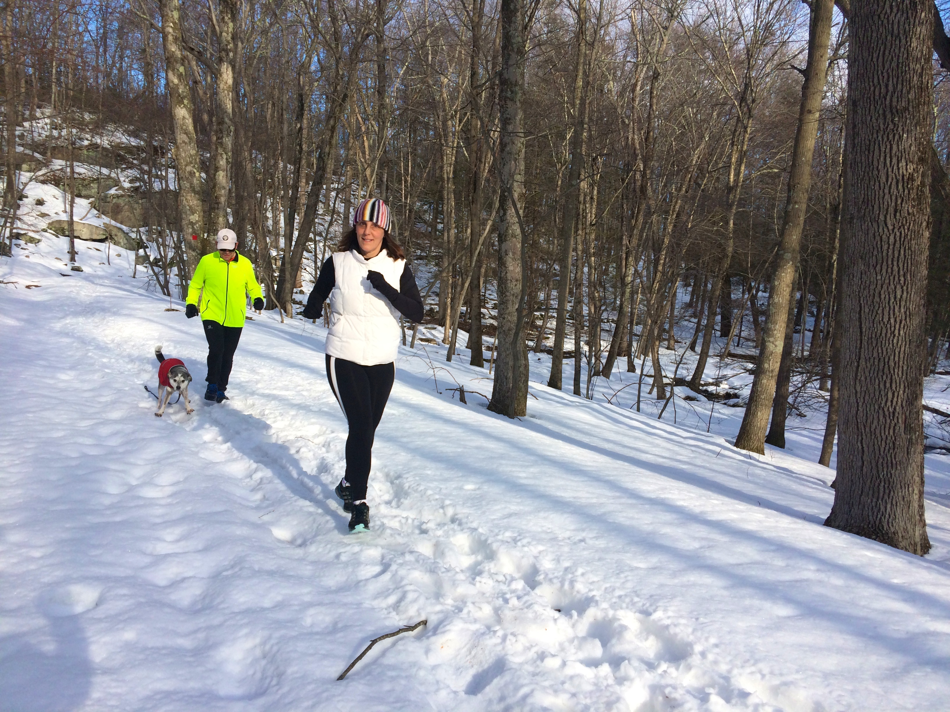Kathy, Barry, and Odie trooping out on the crunch snow of the Red trail section of the ravenFebruary 2015.
