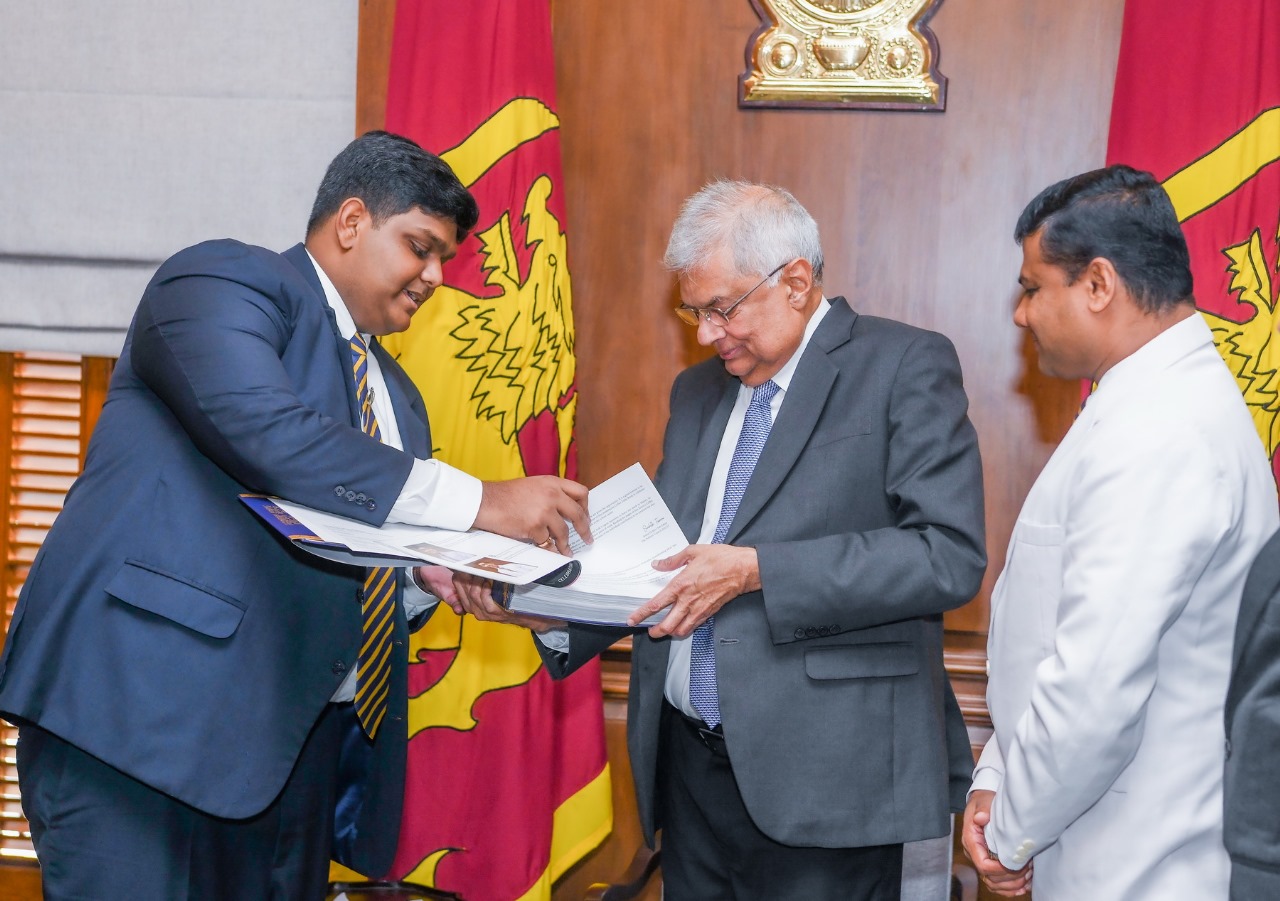 Celebrating 100 Years at Reid Avenue": A Century of Excellence and Tradition at The Royal College Colombo. A copy of The Royal College Magazine “Celebrating 100 Years at Reid Avenue” coffee table book was presented to President Ranil Wickremesinghe yesterday (02) at the Presidential Secretariat. The coffee table book was presented to the President by the Editor of the Magazine Chathil S. Dharmawardena and the Royal College team was accompanied by the Principal Mr. Thilak Waththuhewa, Senior Deputy Principal Mr. L.W.K. Silva, Assistant Principal Mr. M.A.M. Riyaz, Secretary of the Royal College Union Mr. Aruna Samarajewa, Secretary of the School Development Society Mr. W.V.N.B.Weragoda, Head Prefect of the Royal College W.A.S.S. Wanasinghe and the Prefects’s Council of year 2023. "A Century at Reid Avenue" is more than just a book; it's a time capsule of 100 years of history, art, culture, and excellence at The Royal College Colombo. This coffee table book celebrates the institution's evolution from humble beginnings to a beacon of knowledge, character, and tradition, highlighting the achievements of generations of scholars, leaders, and visionaries. It is a tribute to the dedication of teachers, the aspirations of students, and the accomplishments of alumni, honouring the unwavering loyalty to their Alma Mater.