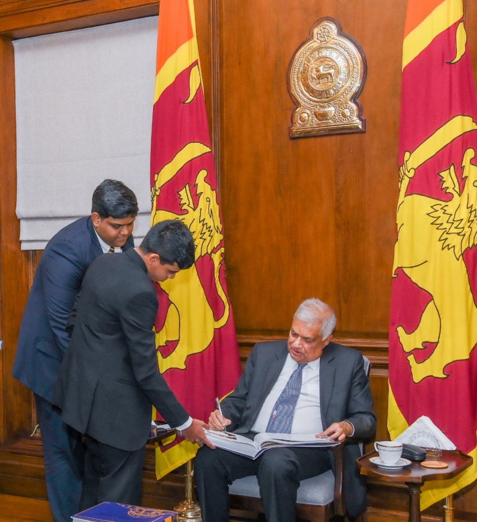 Celebrating 100 Years at Reid Avenue": A Century of Excellence and Tradition at The Royal College Colombo. A copy of The Royal College Magazine “Celebrating 100 Years at Reid Avenue” coffee table book was presented to President Ranil Wickremesinghe yesterday (02) at the Presidential Secretariat. The coffee table book was presented to the President by the Editor of the Magazine Chathil S. Dharmawardena and the Royal College team was accompanied by the Principal Mr. Thilak Waththuhewa, Senior Deputy Principal Mr. L.W.K. Silva, Assistant Principal Mr. M.A.M. Riyaz, Secretary of the Royal College Union Mr. Aruna Samarajewa, Secretary of the School Development Society Mr. W.V.N.B.Weragoda, Head Prefect of the Royal College W.A.S.S. Wanasinghe and the Prefects’s Council of year 2023. "A Century at Reid Avenue" is more than just a book; it's a time capsule of 100 years of history, art, culture, and excellence at The Royal College Colombo. This coffee table book celebrates the institution's evolution from humble beginnings to a beacon of knowledge, character, and tradition, highlighting the achievements of generations of scholars, leaders, and visionaries. It is a tribute to the dedication of teachers, the aspirations of students, and the accomplishments of alumni, honouring the unwavering loyalty to their Alma Mater.