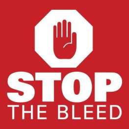Stop the Bleed logo with red background and white stop hand symbol