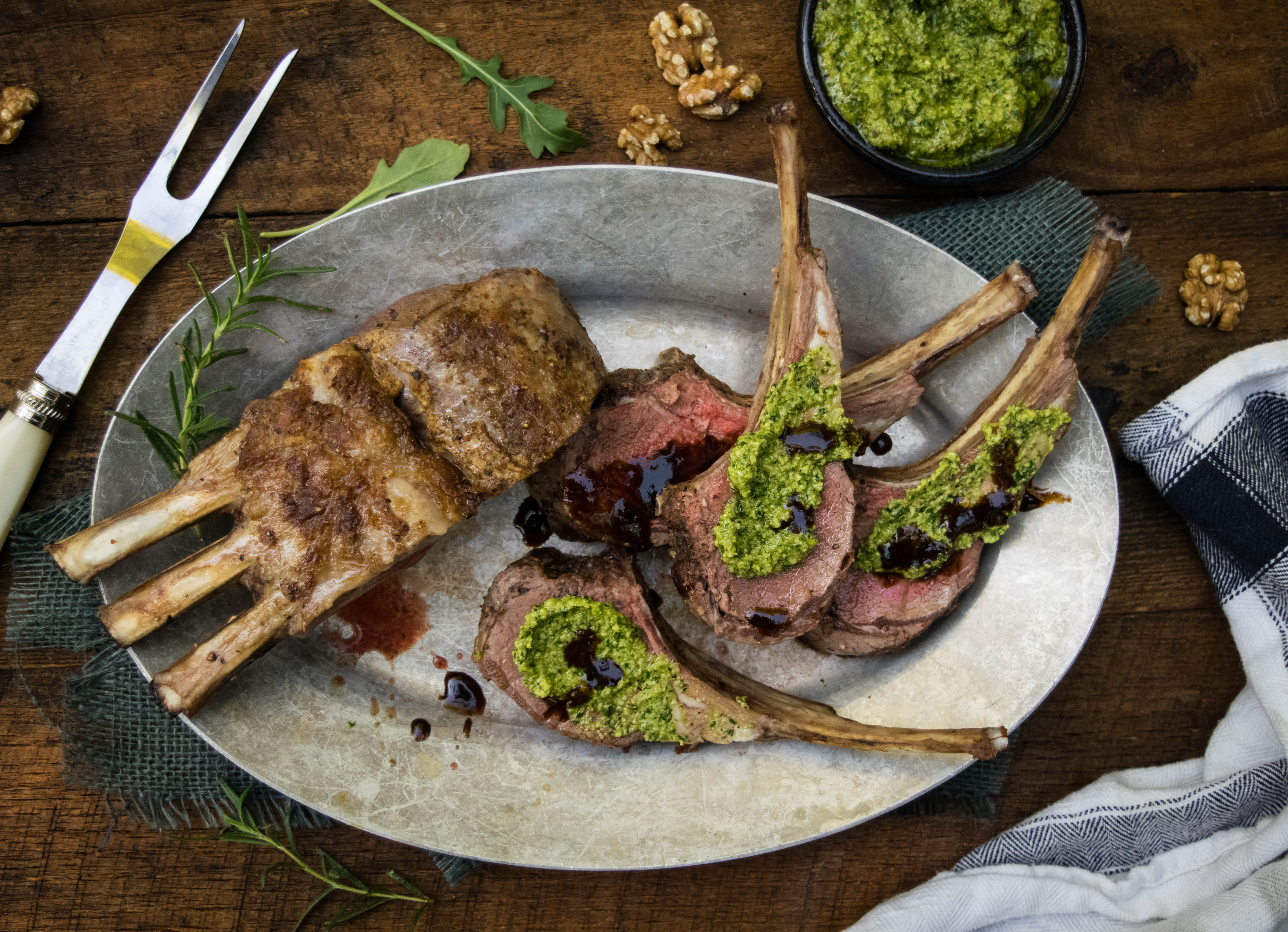 Rack of Lamb with Arugula Pesto and Orange Balsamic Drizzle