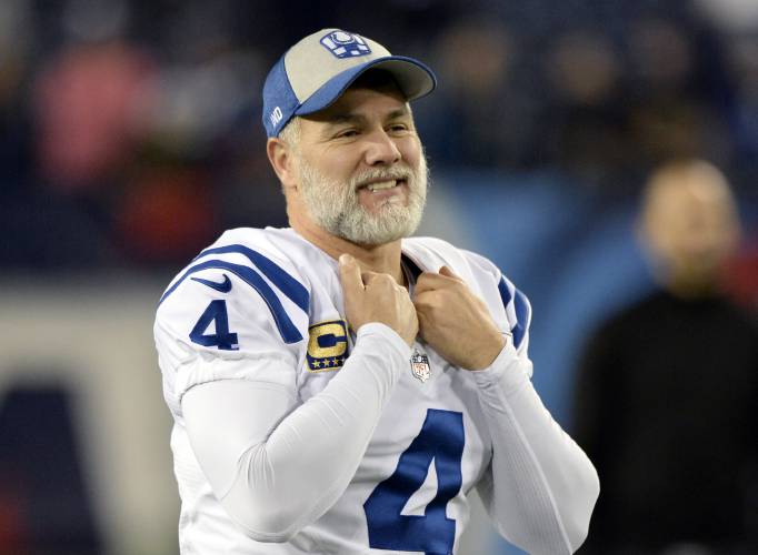 Indianapolis Colts kicker Adam Vinatieri walks on the field Dec. 30 before a game against the Tennessee Titans, in Nashville, Tenn.