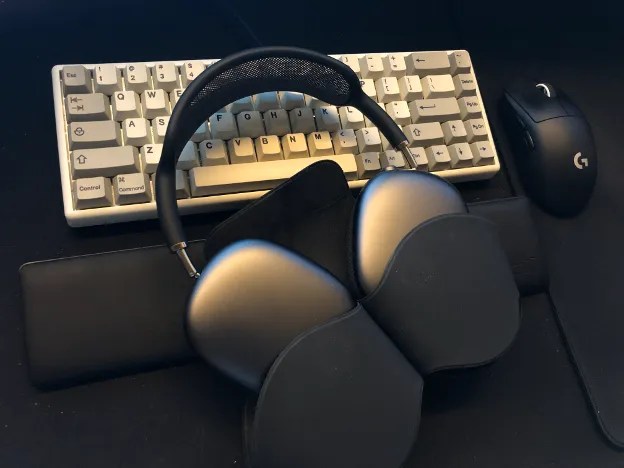 Apple AirPods Max headphones inside of smart case