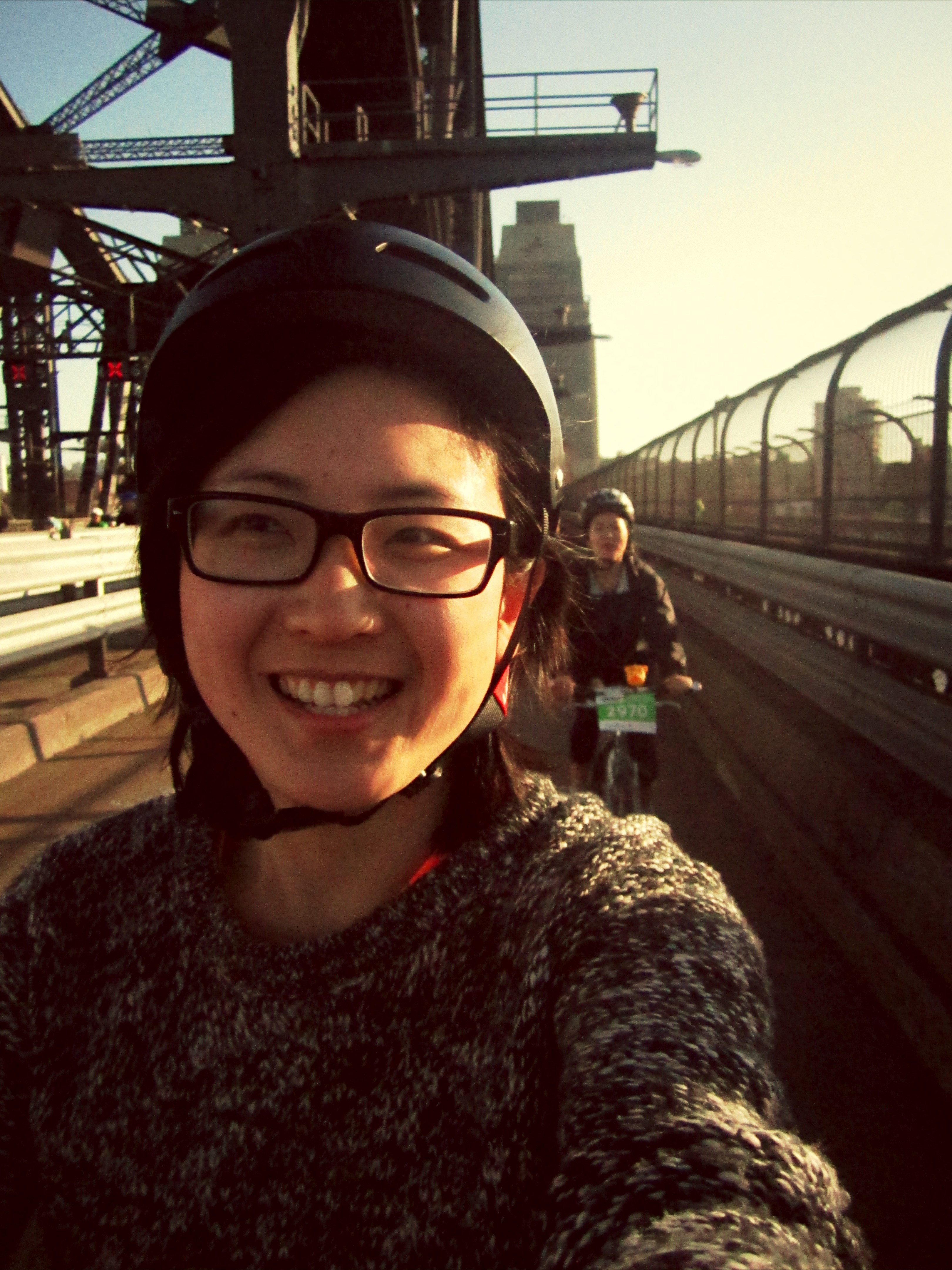 red bike on bridge