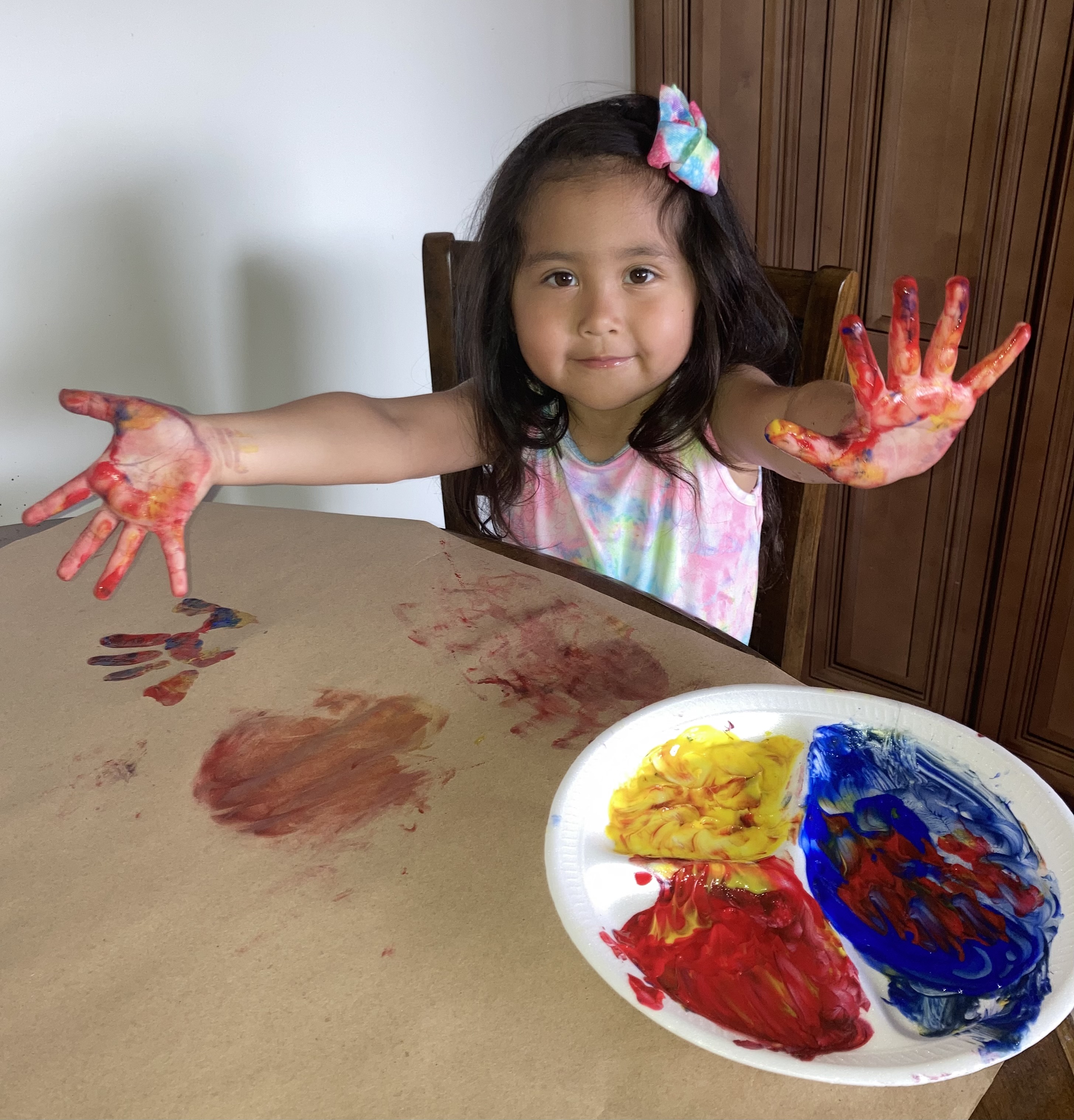Fingerpainting gift wrap.
