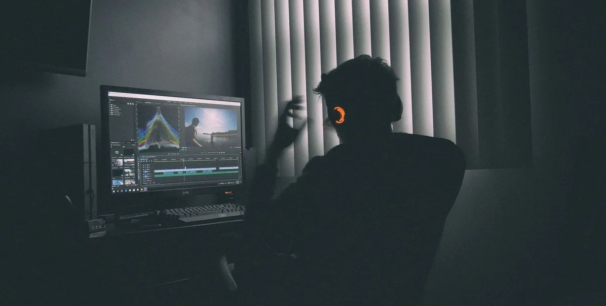 The best remote jobs for introverts: Video editor working, location unknown, date unknown.