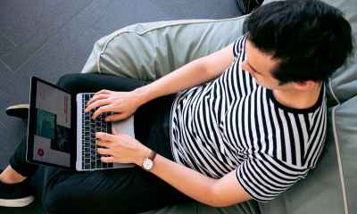 photo of man using laptop