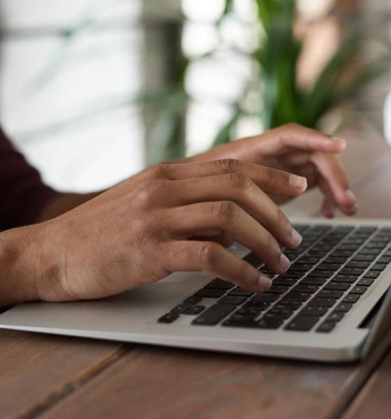 person using macbook pro