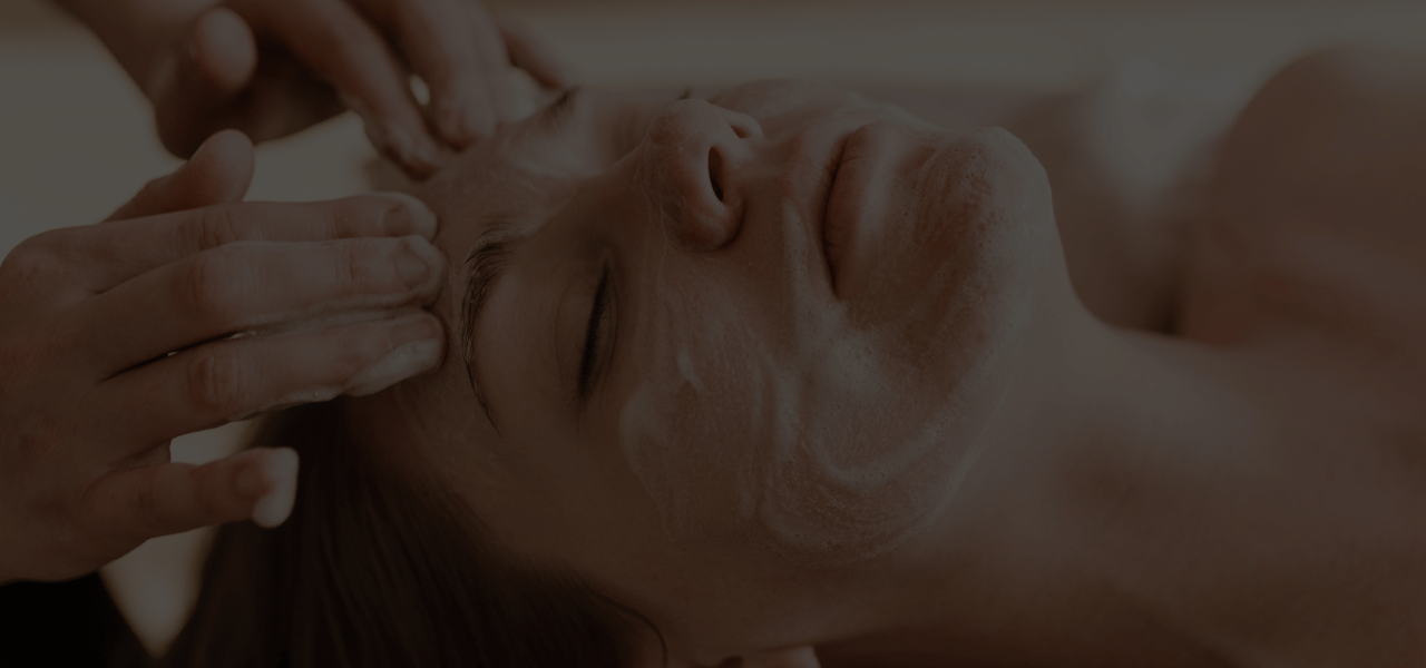 Person getting a facial treatment.