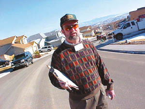 Former Reno City Council candidate Mike Tracy is hitting the streets in his neighborhood asking registered voters to sign a petition that would force a vote on the proposed train trench through downtown Reno.