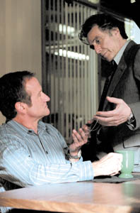 Robin and Al compare the sizes of each other’s imaginary frogs.