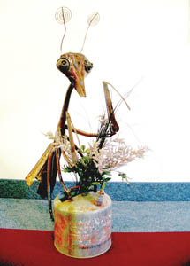 Will the praying mantis with a bicycle-seat head be a Recycled Art(icles) prizewinner? The results (and the artist’s name) will be revealed at the artists’ reception.