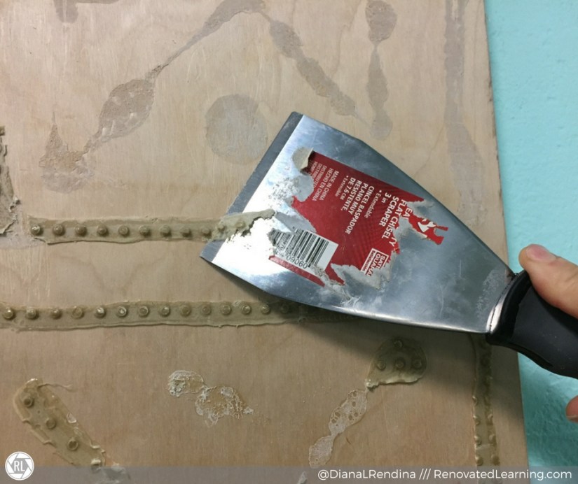 Remove dried glue from the wall