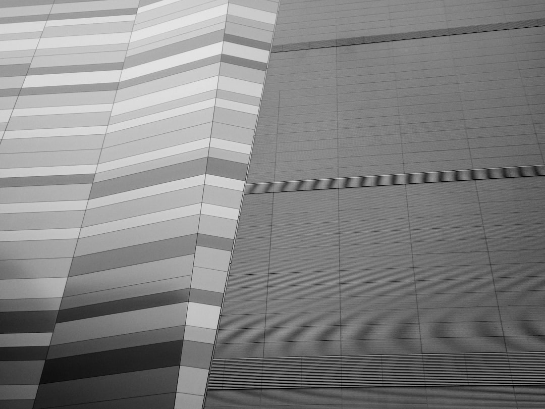 a black and white photo of a tall building