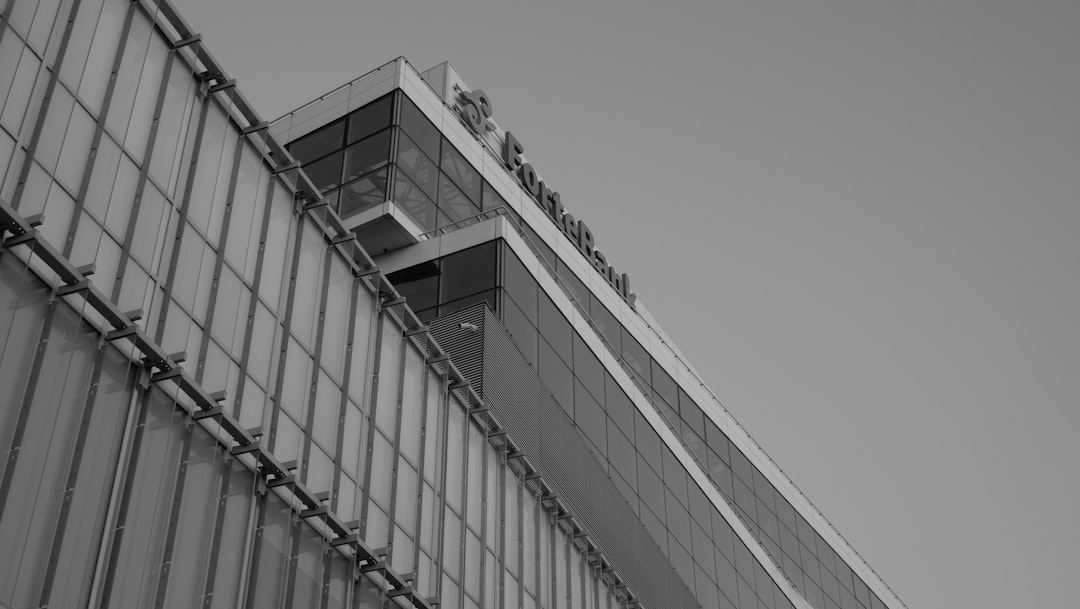 a black and white photo of a tall building