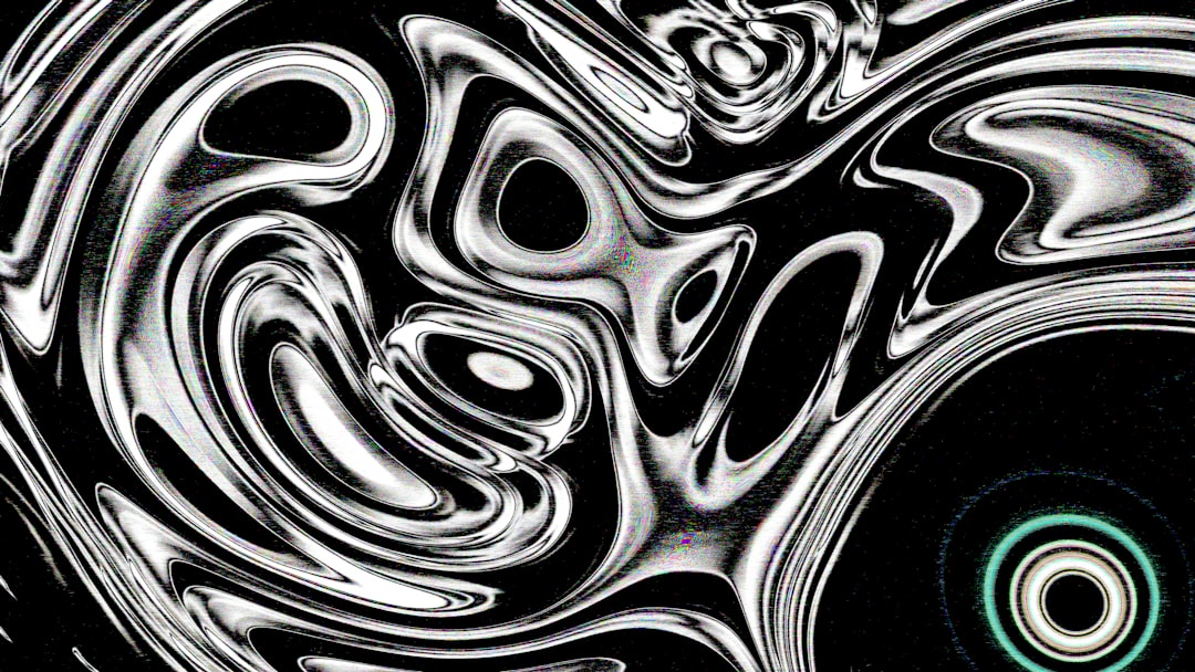Abstract swirling black and white metallic patterns
