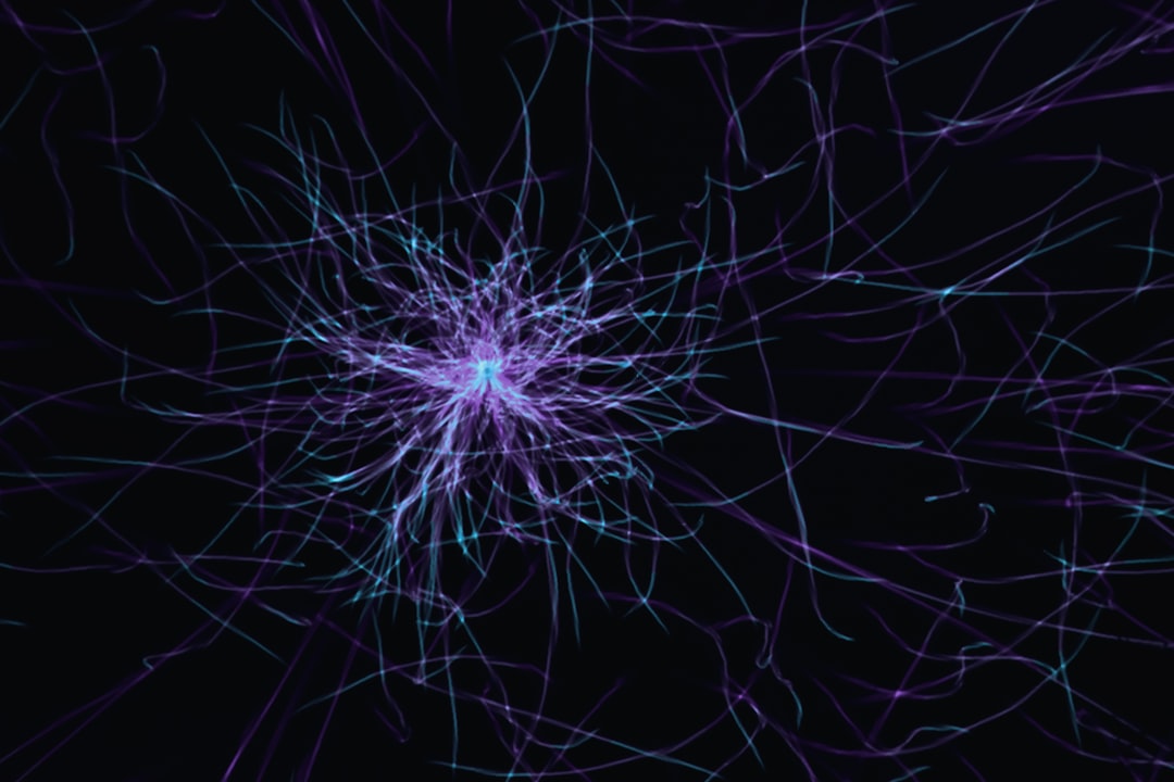 a purple and blue abstract pattern on a black background