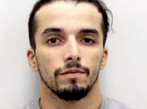 Accidentally freed prisoner locked up for biting police officers