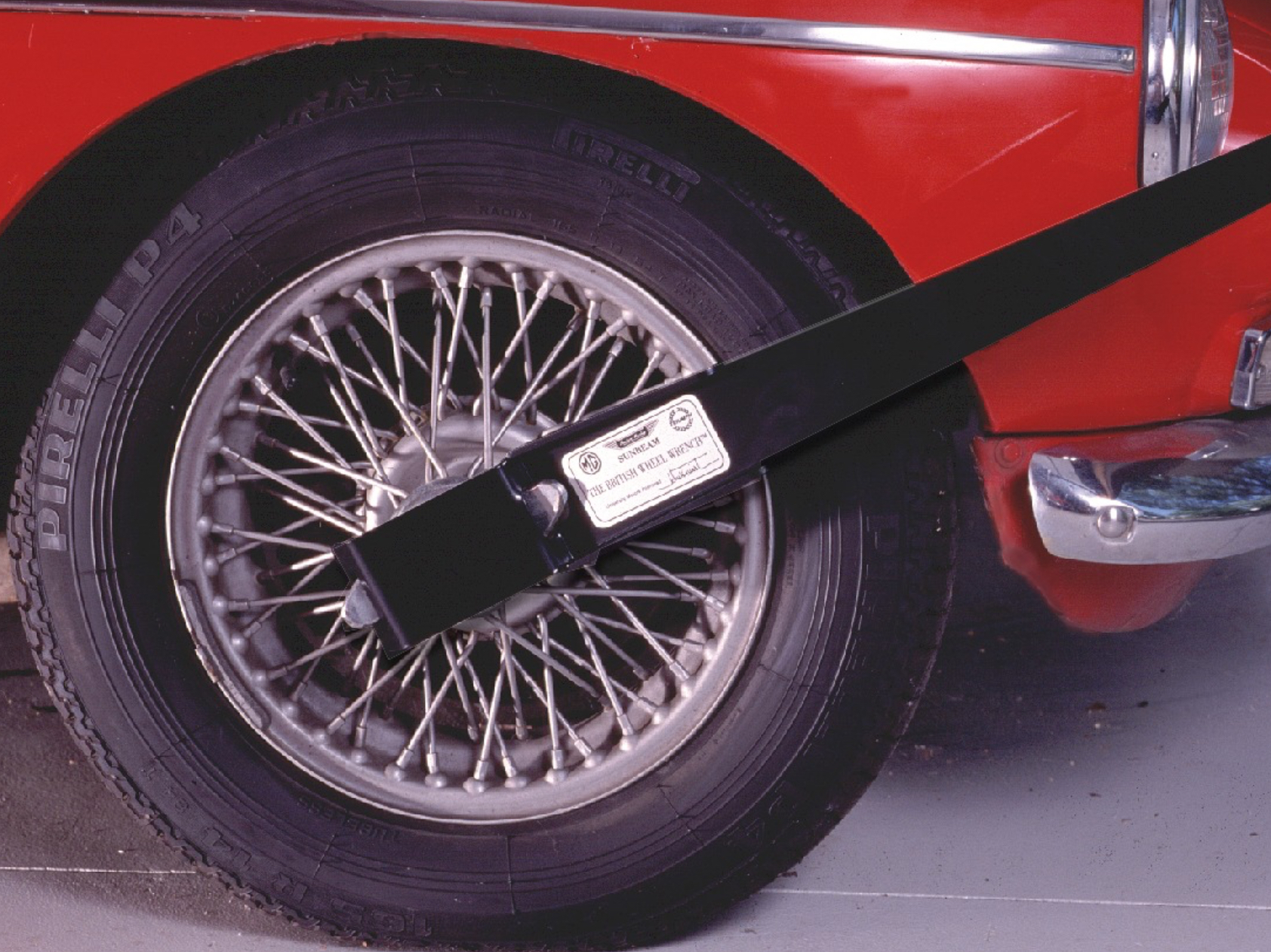 Long reach wire wheel wrench spanner for two eared spinners