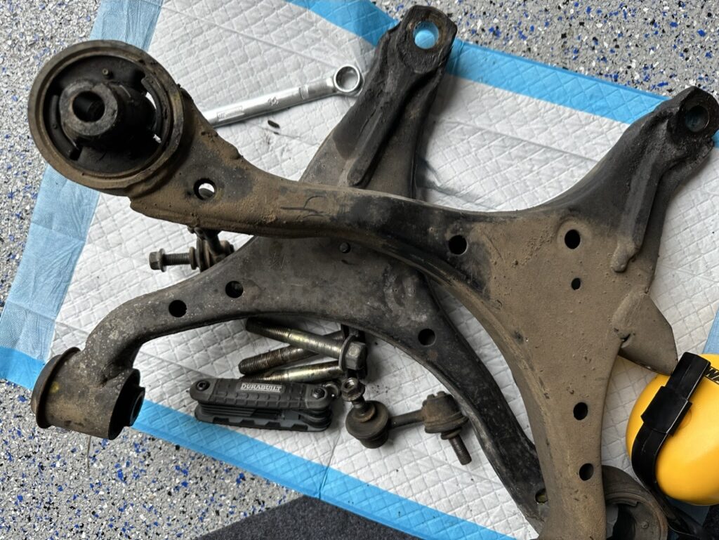 Old RSX Front Lower Control Arms. Torn Bushings.