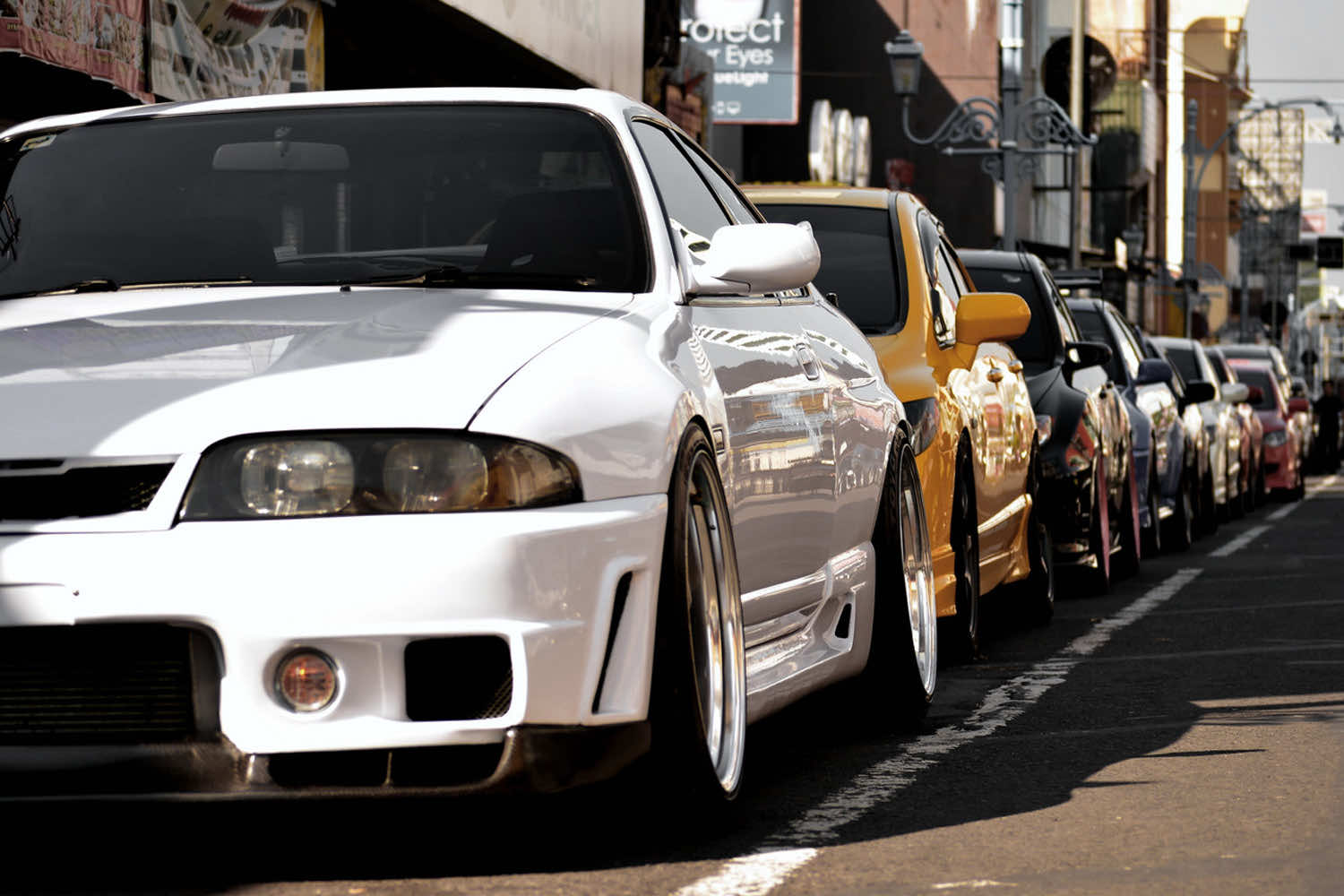 Person wearing a JDM streetwear outfit on the street