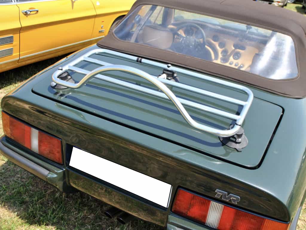 green tvr s with a brown hood with a chrome luggage rack fitted to it photographed from above