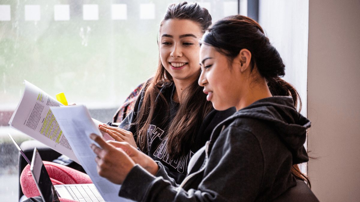 Two RGU students studying together