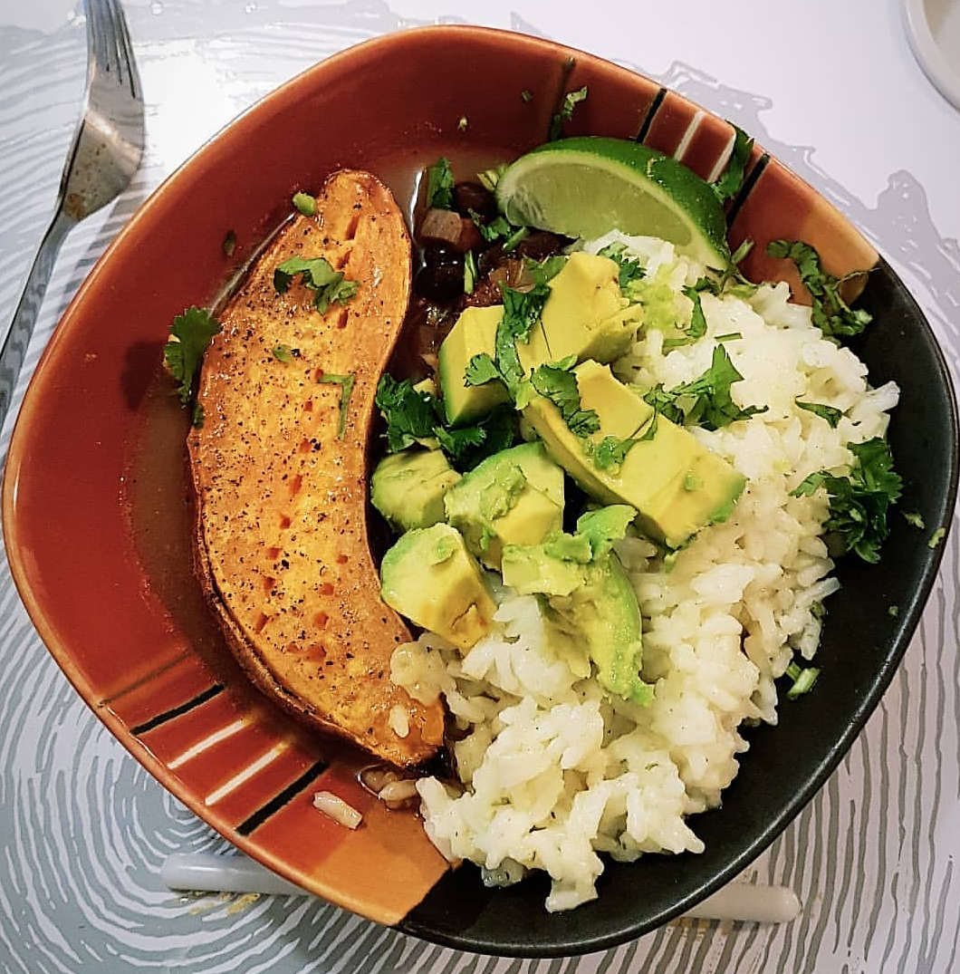 black bean and tomatillo chili loaded sweet potatoes