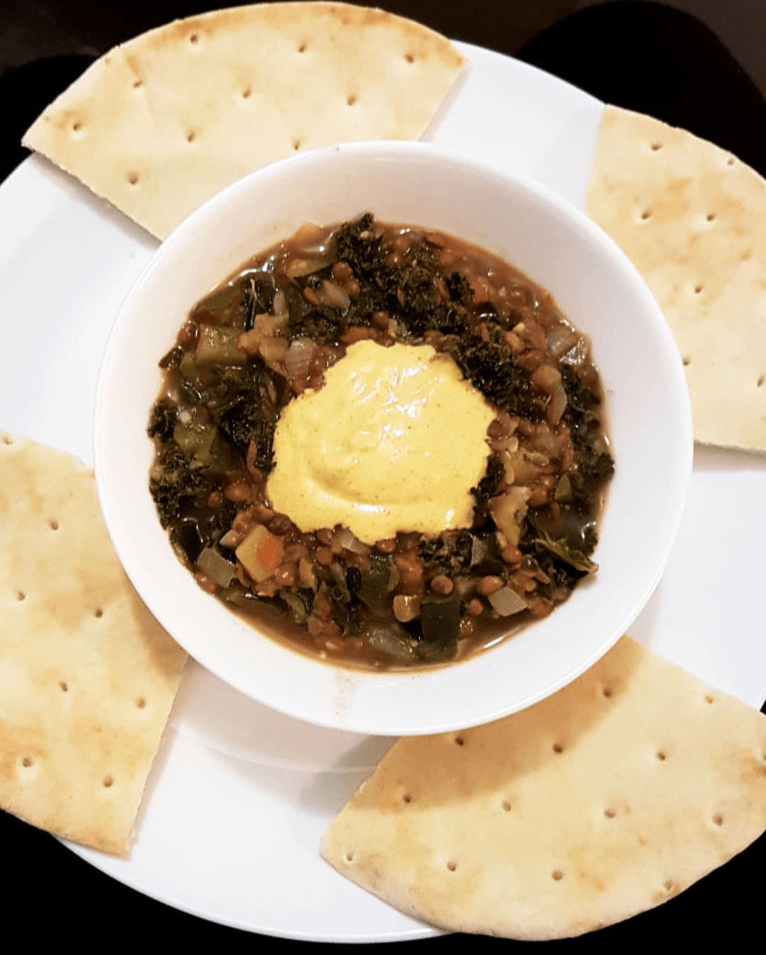 lentil stew with curried yogurt and garlic naan