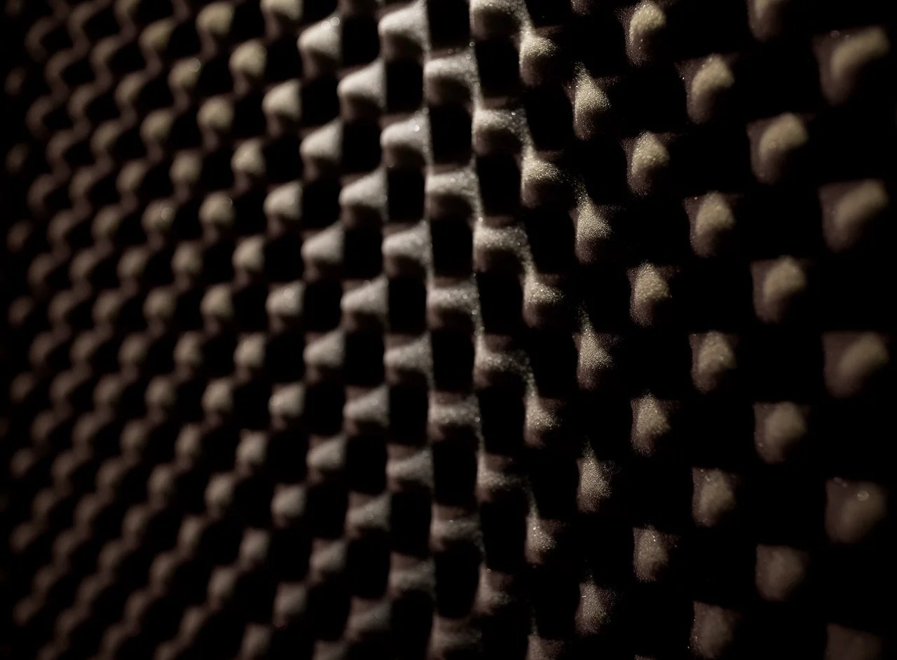 acoustic materials, texture and soundproofing concept - foam rubber surface at sound recording studio