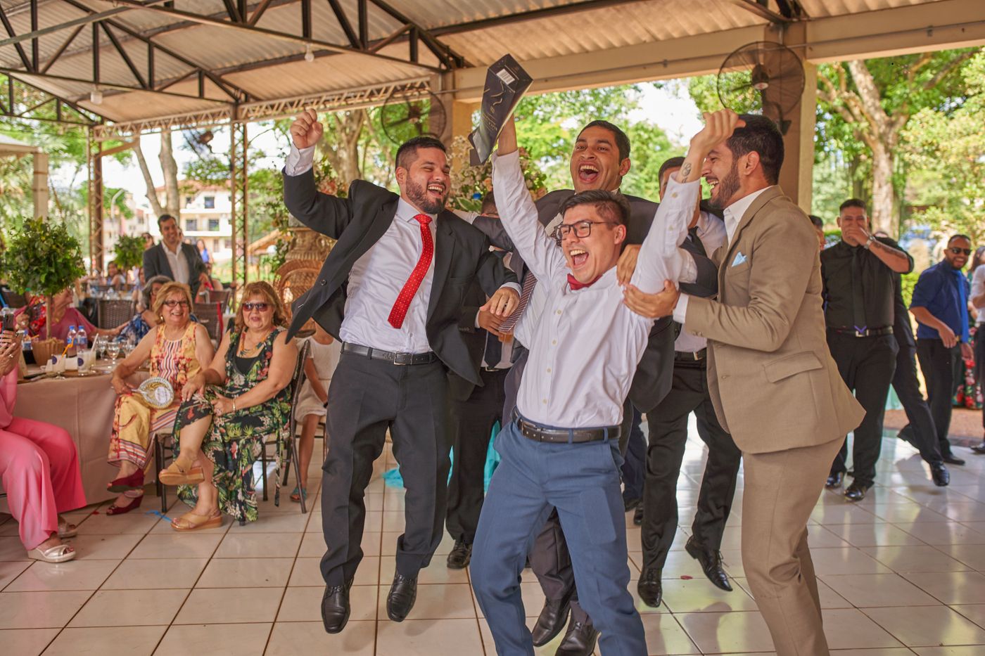Well-dressed friends celebrating together