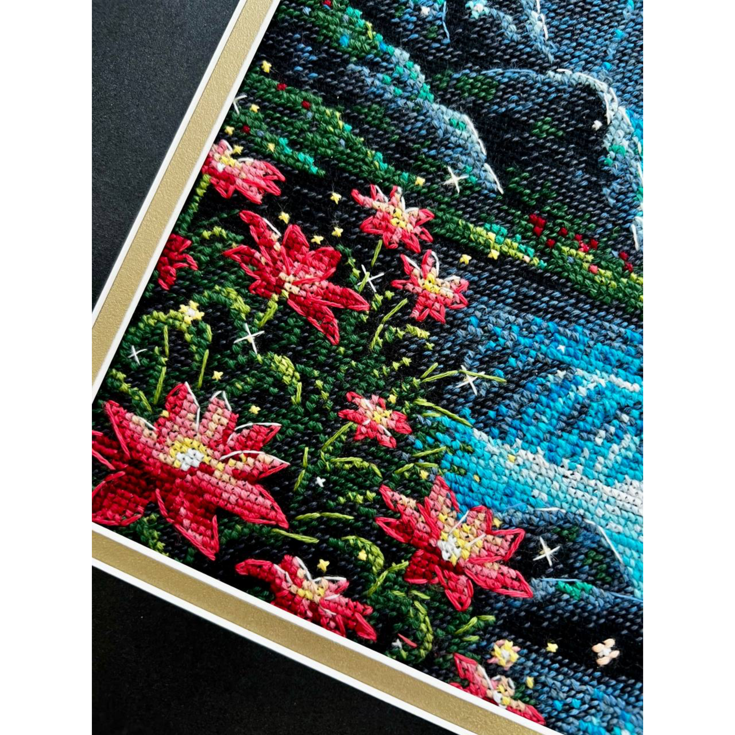 A glowing waterfall cascades over dark rocks surrounded by autumn trees and bright flowers under a colorful sunset sky.