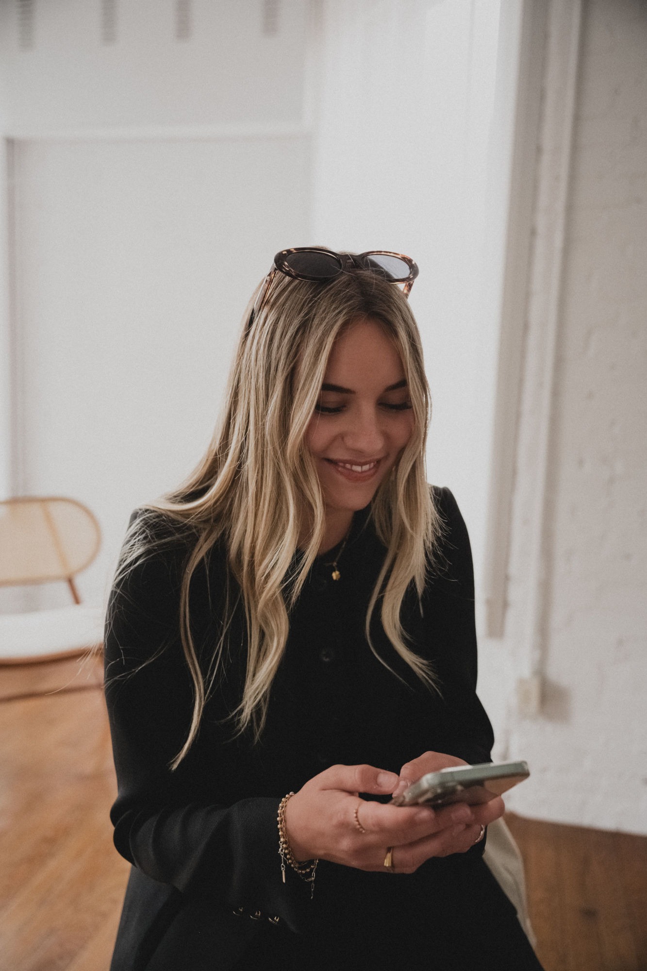 Summer Intern on Her Phone - Calgary Marketing and Web Design Company