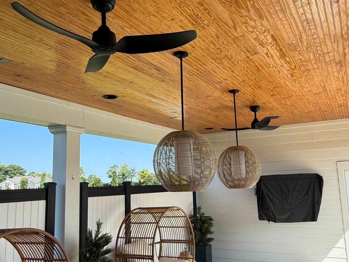 electrician installing ceiling light fixture northern kentucky