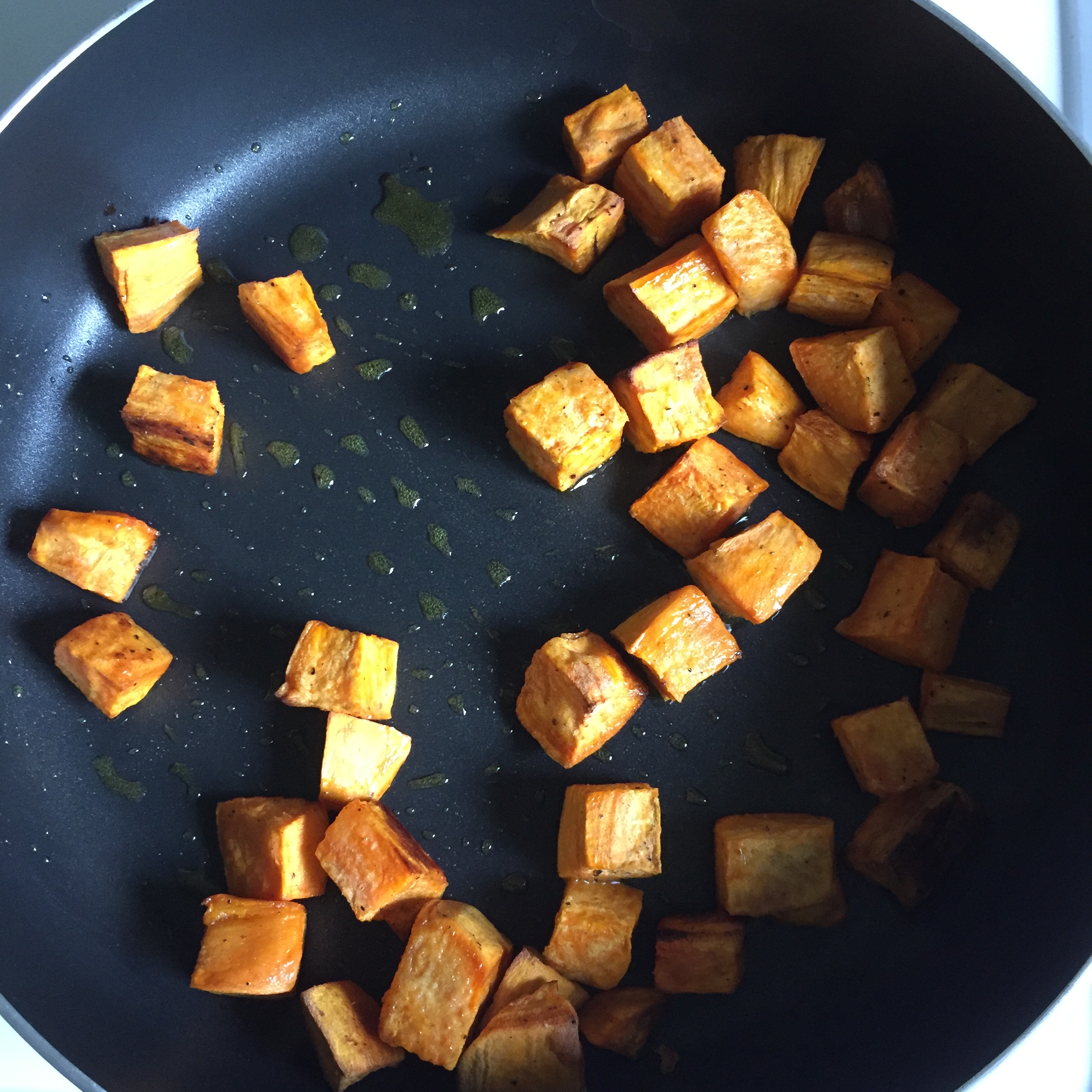 Toasting sweet potatoes, beforehand roasted in the oven