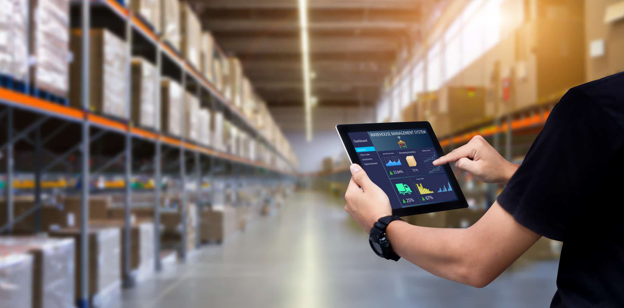 Smart Warehouse,Inventory management system concept.Manager using digital tablet,showing warehouse software management
