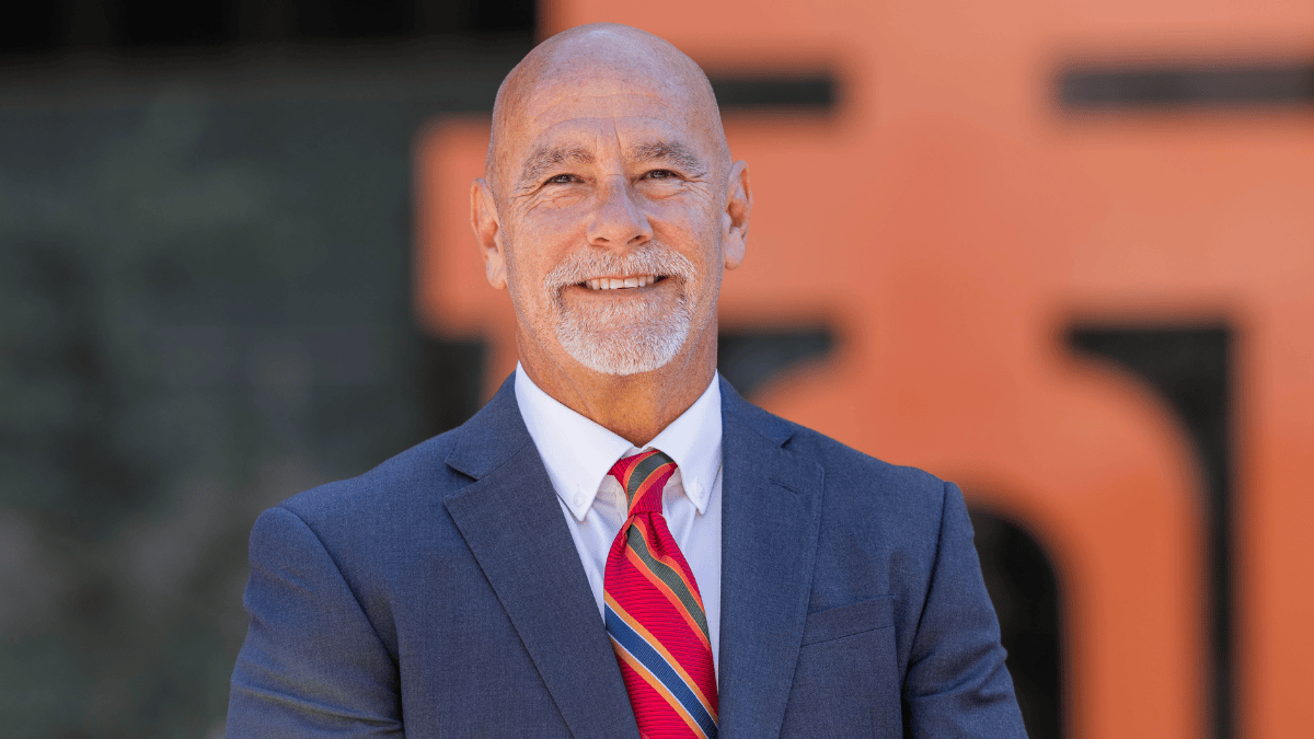 A portrait of Tom Hatch outside Riverside City Hall.