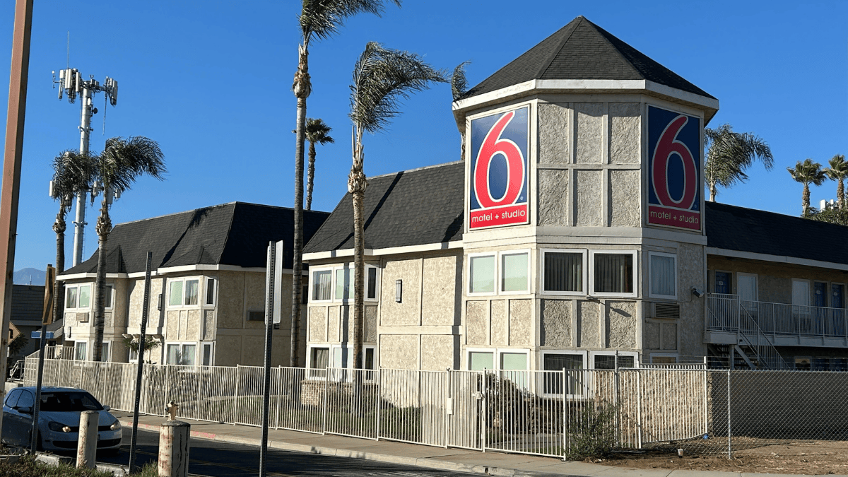 An exterior photograph of a Motel 6 in Riverside.