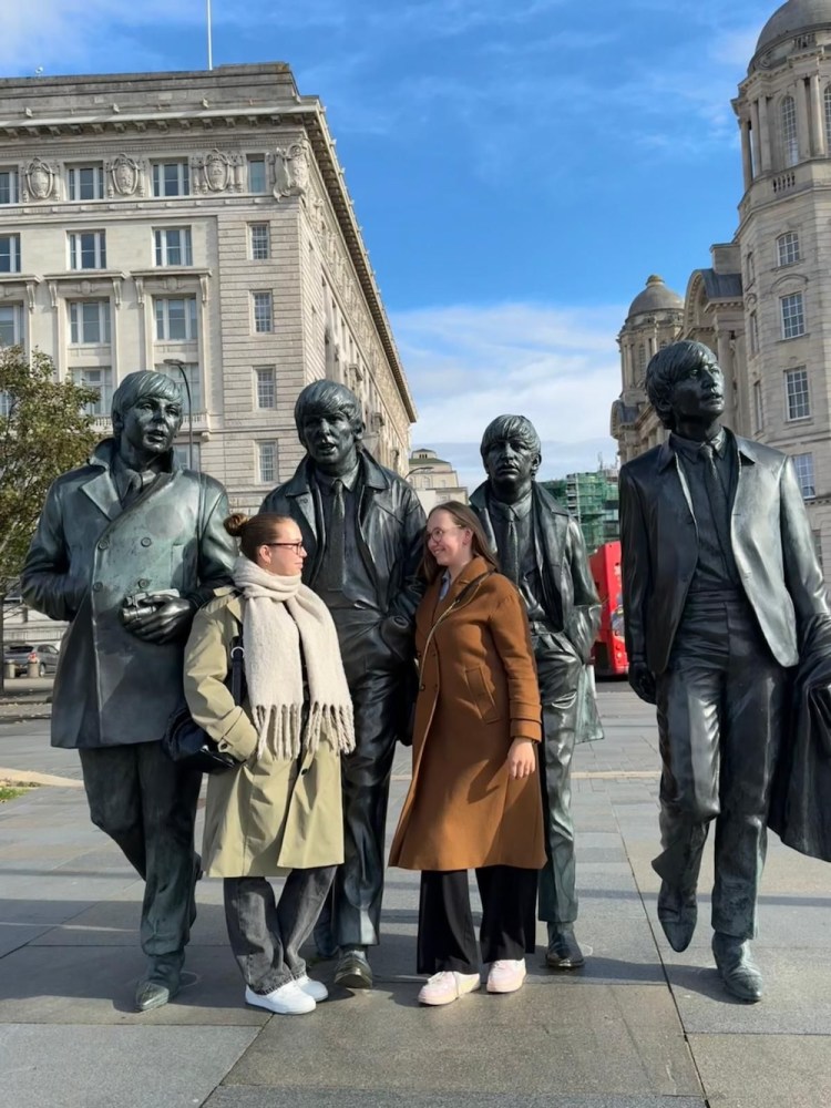 Tourists with Beatles Sculpture in Liverpool