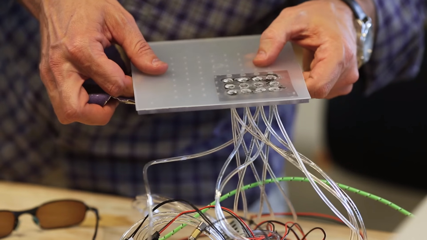 the tactile layer with pneumatic actuators