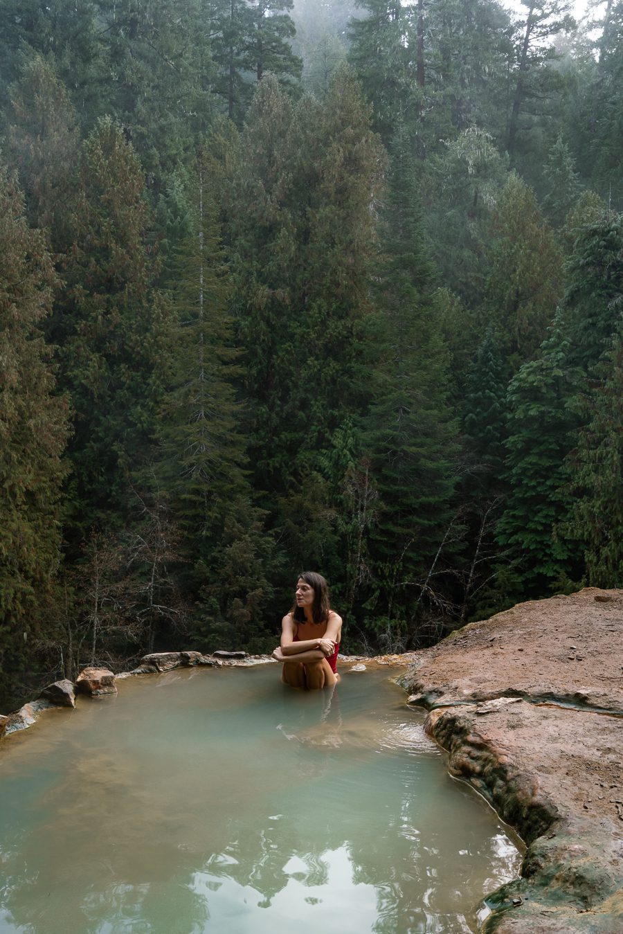 woman at a hot spring in oregon united states